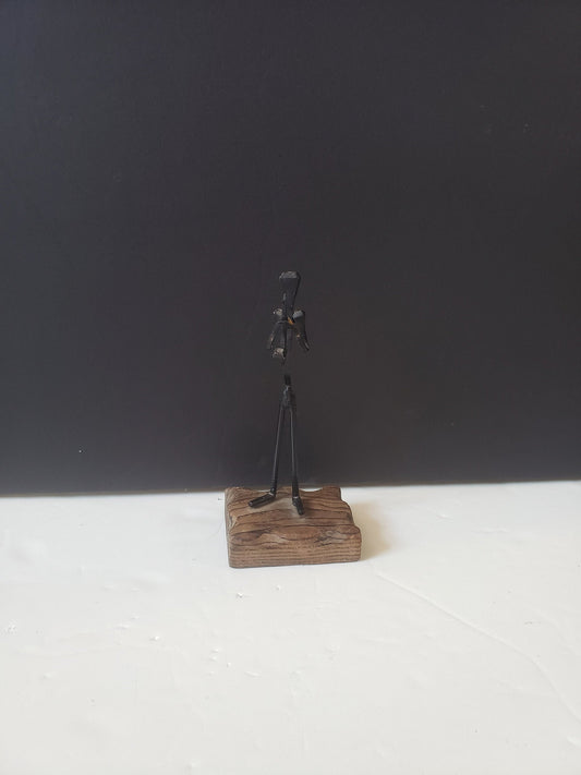 Cast Metal Saxophone Player on Wood Stand