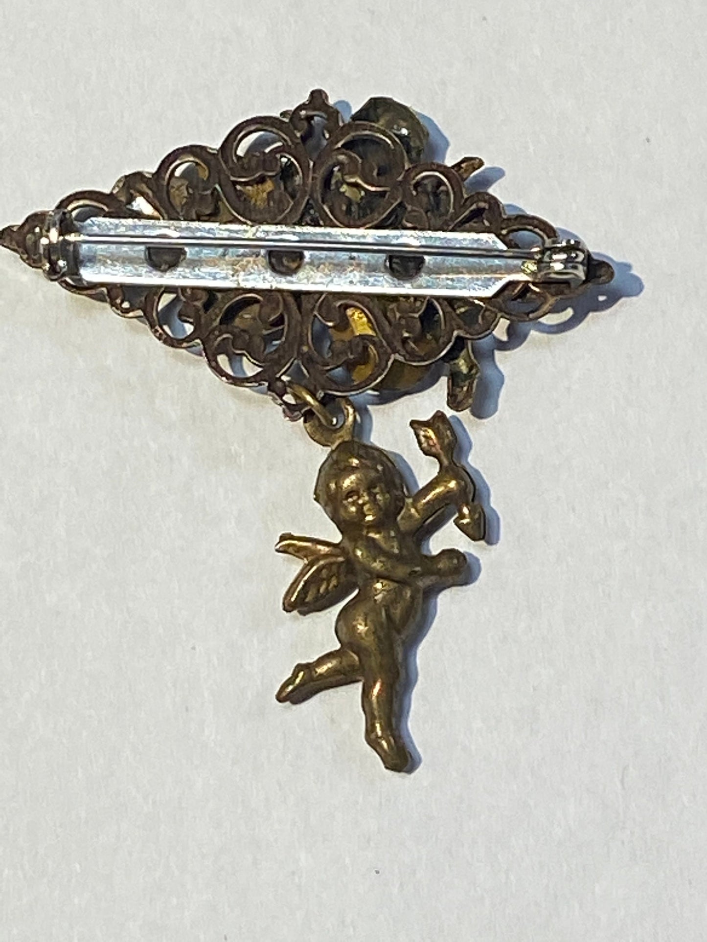 Beautiful brass Cupid brooch