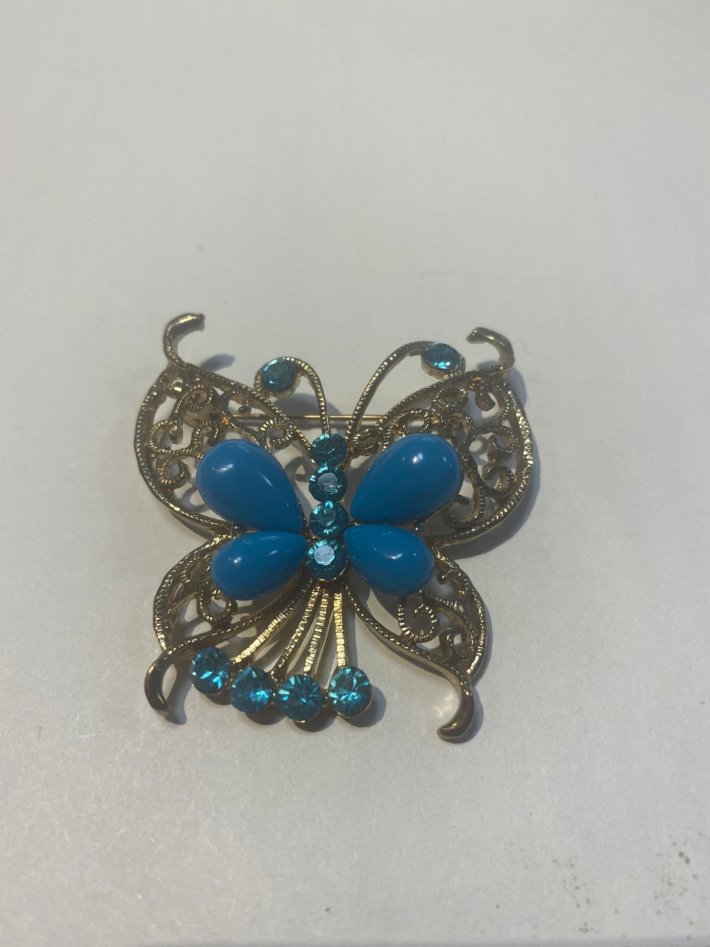 Turquoise and rhinestone butterfly brooch