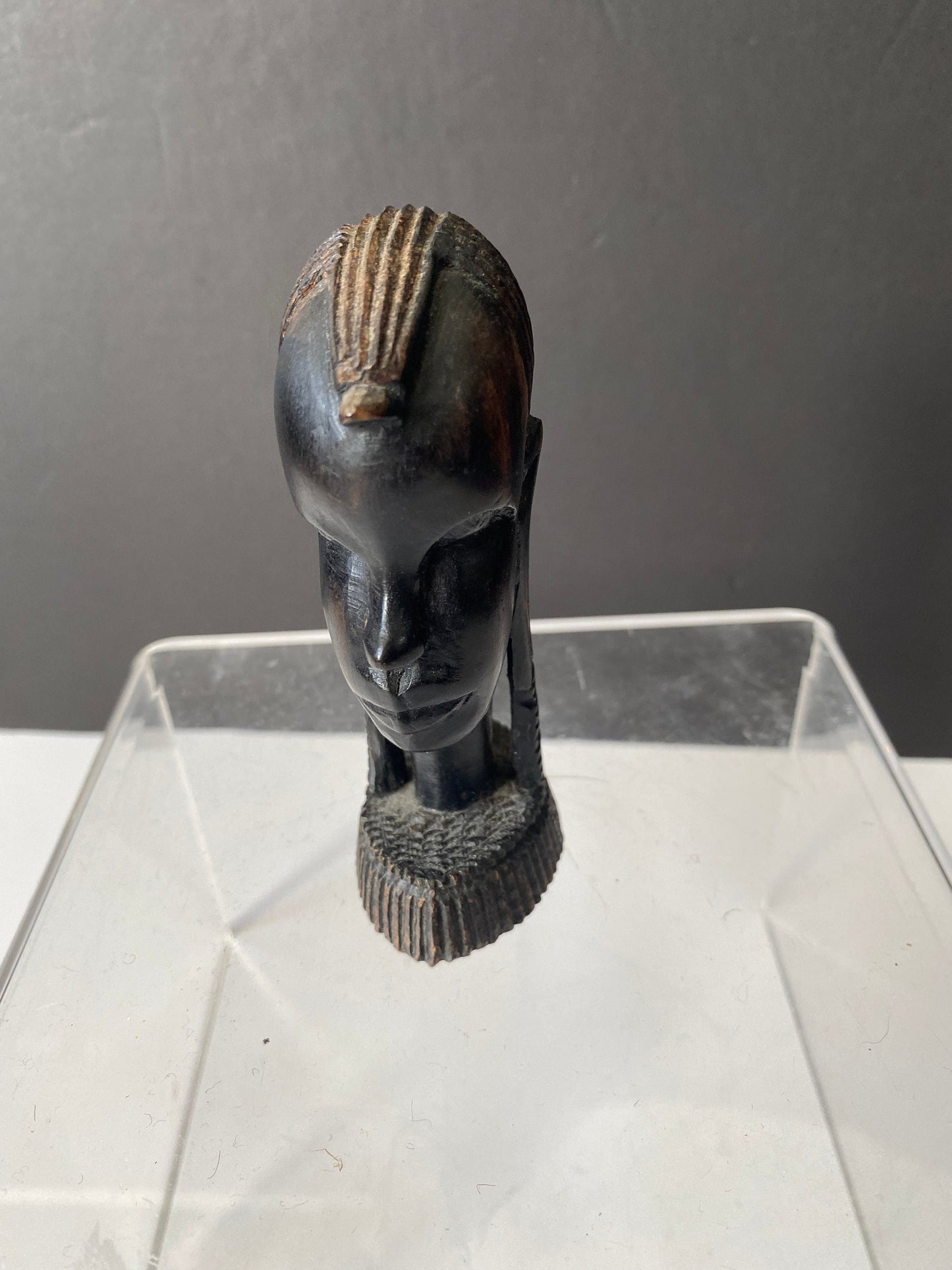 A 9 inch African Kenyan ebony wooden bust of a woman