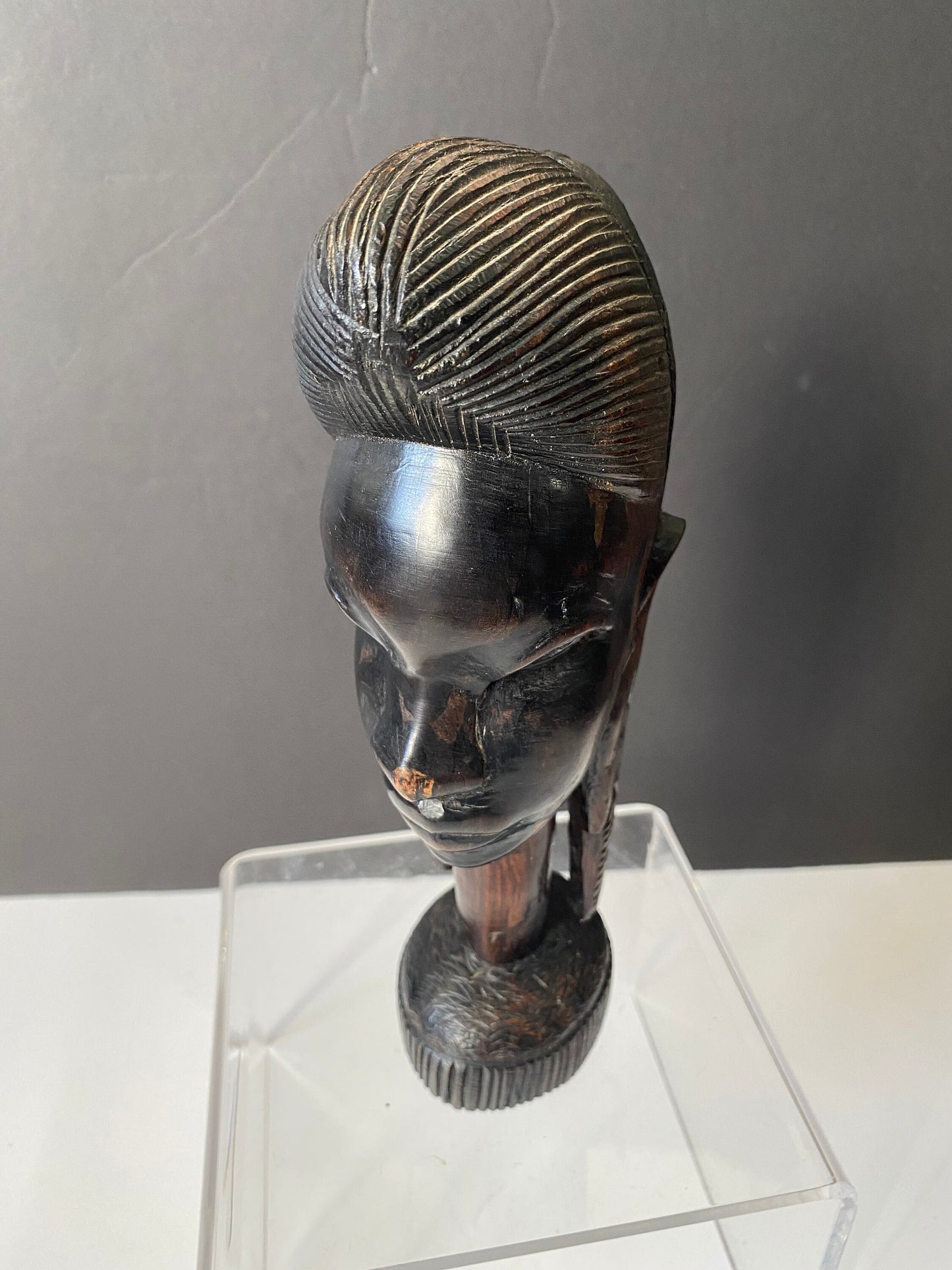 A 9 inch African Kenyan ebony wooden bust of a woman