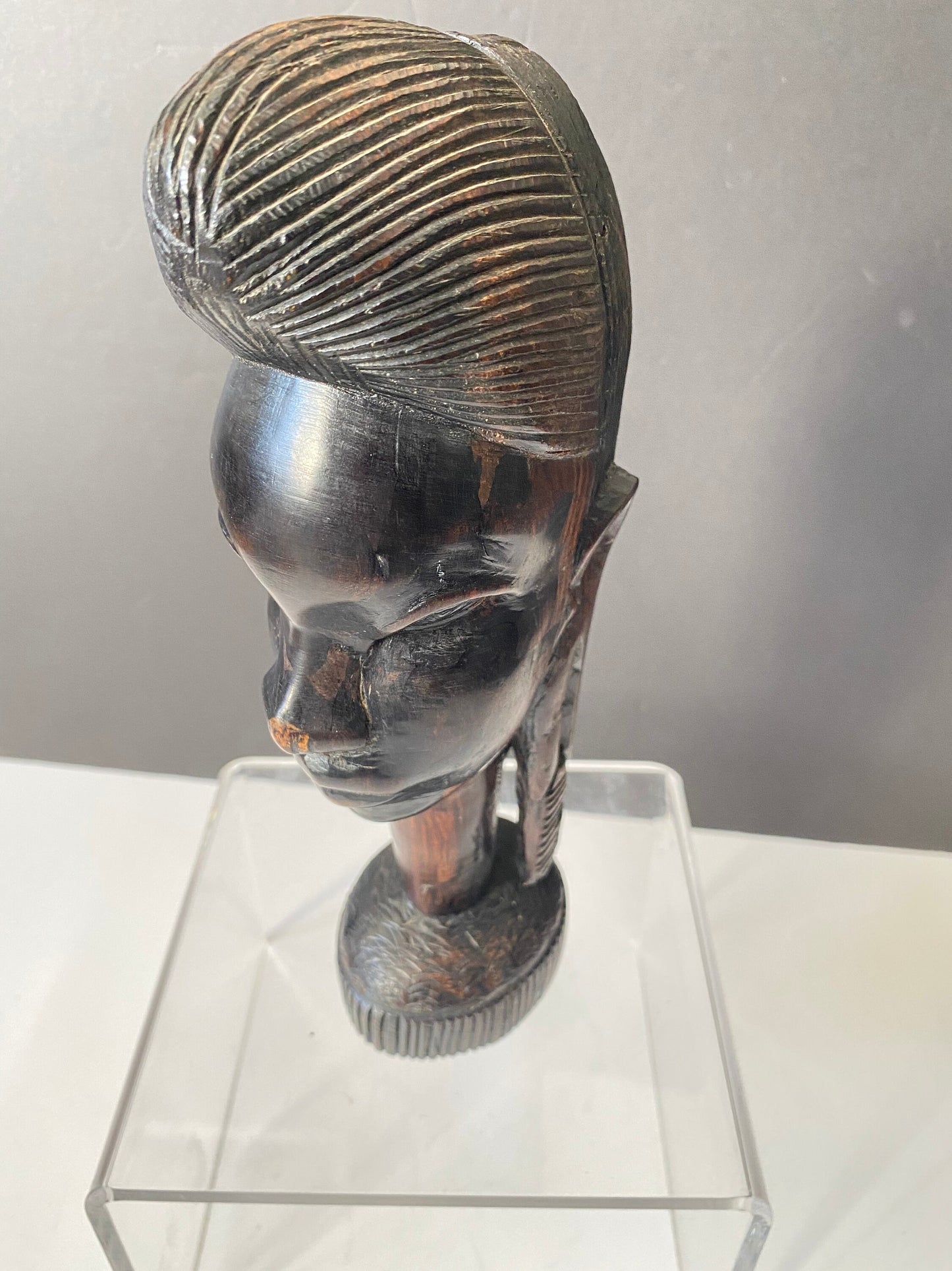 A 9 inch African Kenyan ebony wooden bust of a woman