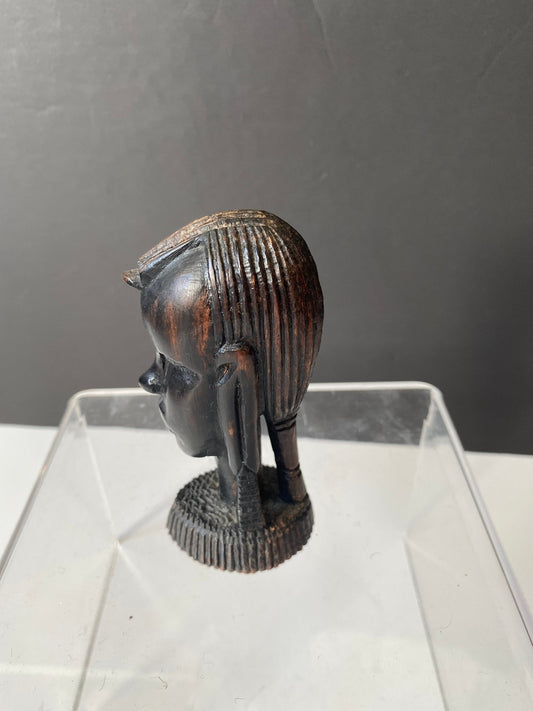 A 9 inch African Kenyan ebony wooden bust of a woman