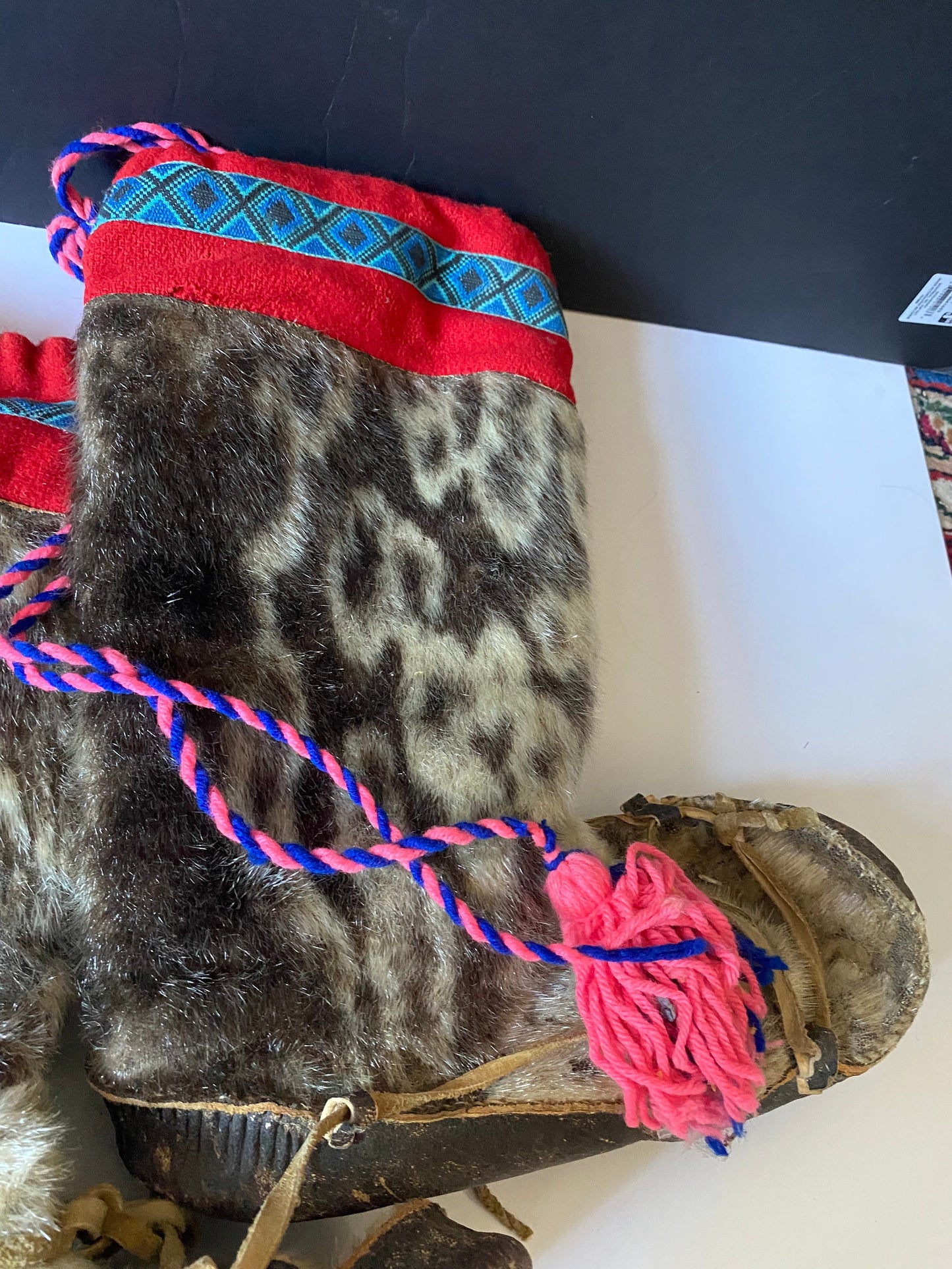 A  Magnificent pair of antique First Nations Canadian Inuit seal skin and embroidered moccasins  Boot 12 inches long and 16 inches tall