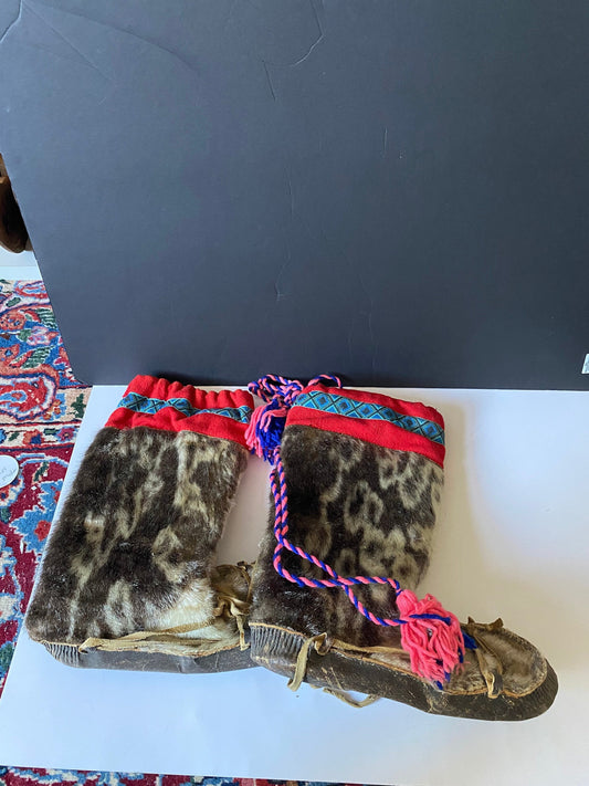 A  Magnificent pair of antique First Nations Canadian Inuit seal skin and embroidered moccasins  Boot 12 inches long and 16 inches tall