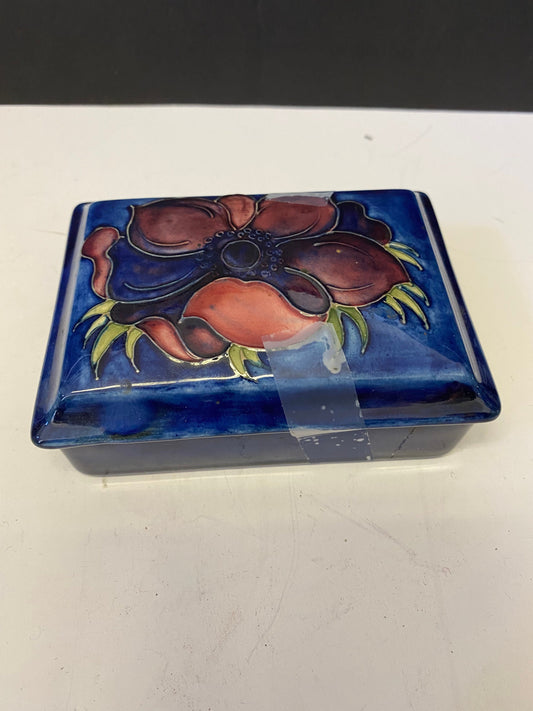 A 5 inch moorcroft   Hibiscus box with crack on bottom but lid  perfect  Signed with original sticker