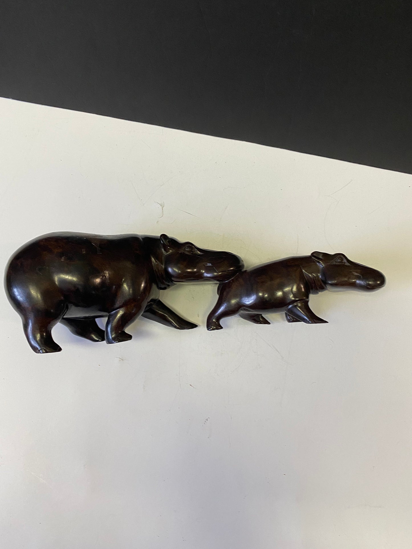 A  Spectacular 13 inch pipe African vintage Ebony wood hippos  mother and child hippopotamus   Has to be seen to be truly appreciated