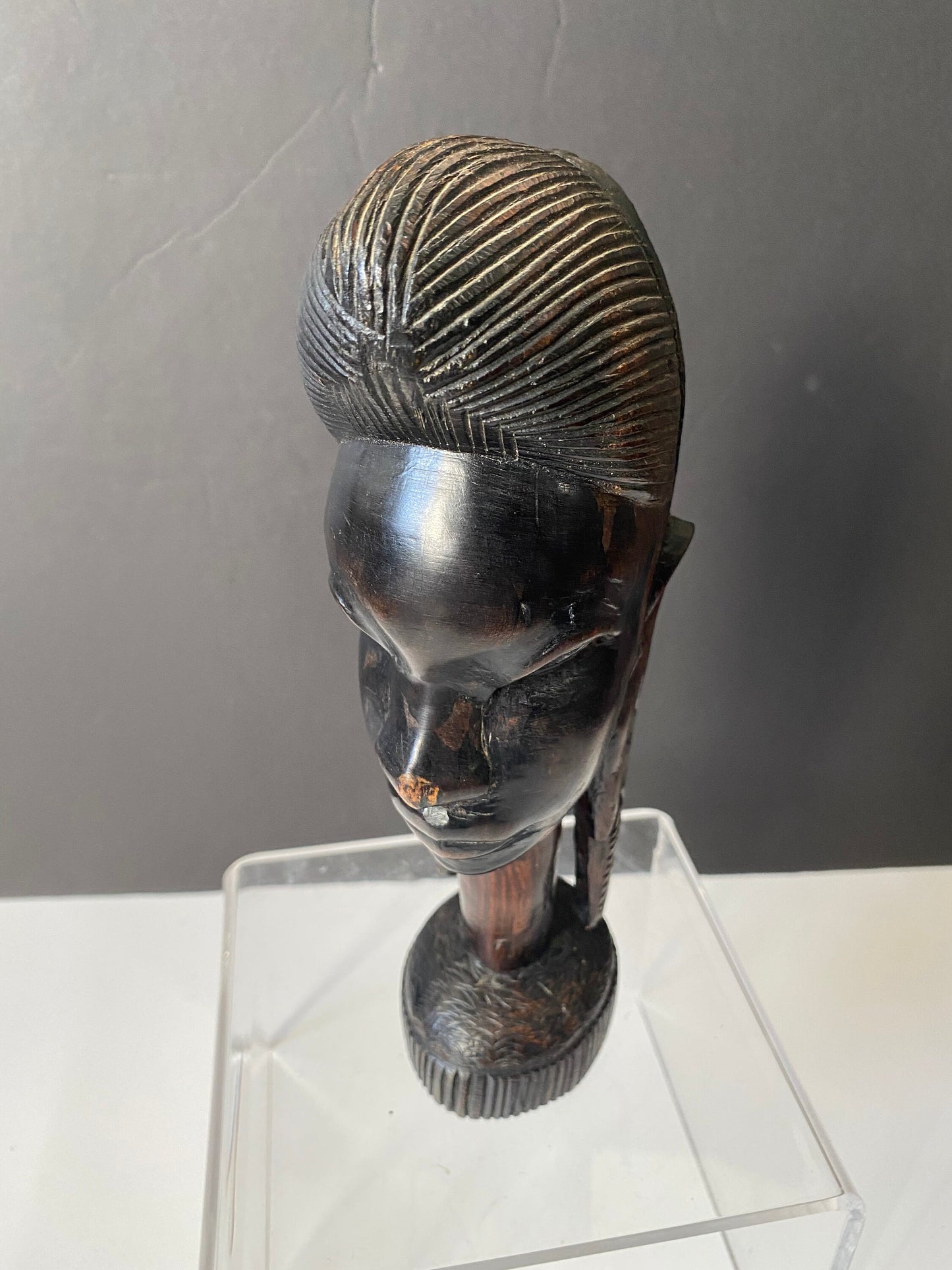 A 9 inch African Kenyan ebony wooden bust of a woman