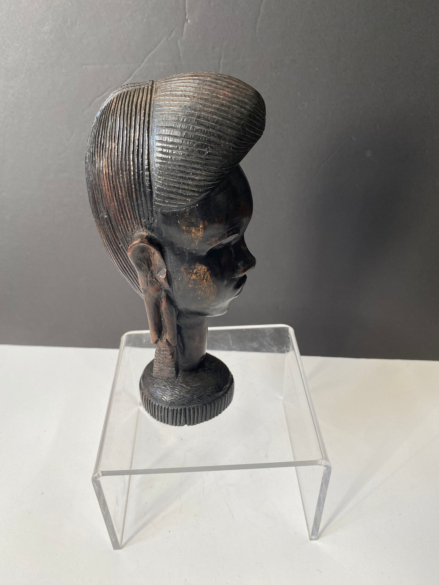 A 9 inch African Kenyan ebony wooden bust of a woman