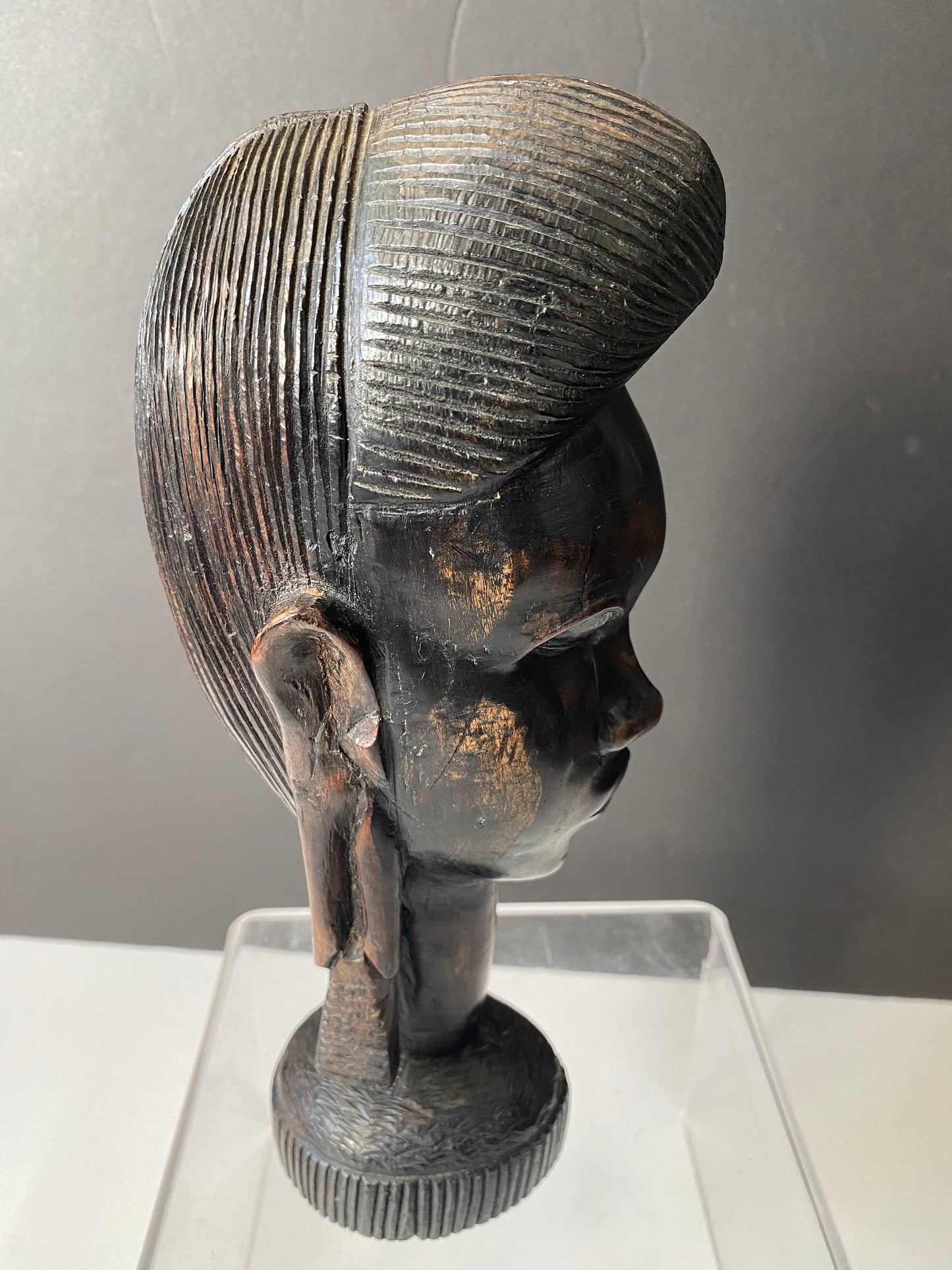 A 9 inch African Kenyan ebony wooden bust of a woman