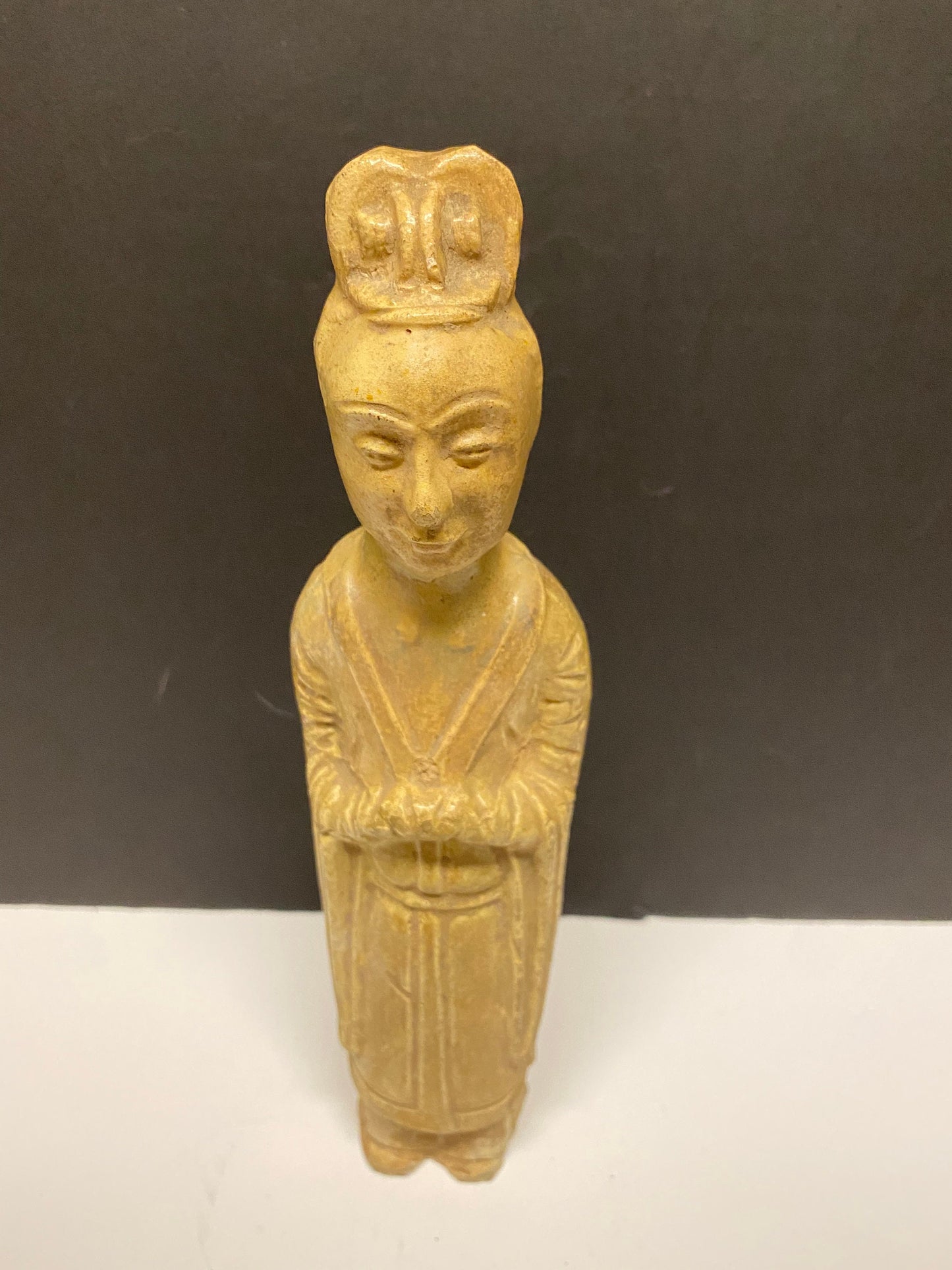 A  Museum quality 11 inch Chinese pottery statue depicting serene praying man  Evaluated as sui dynasty  small crack in neck