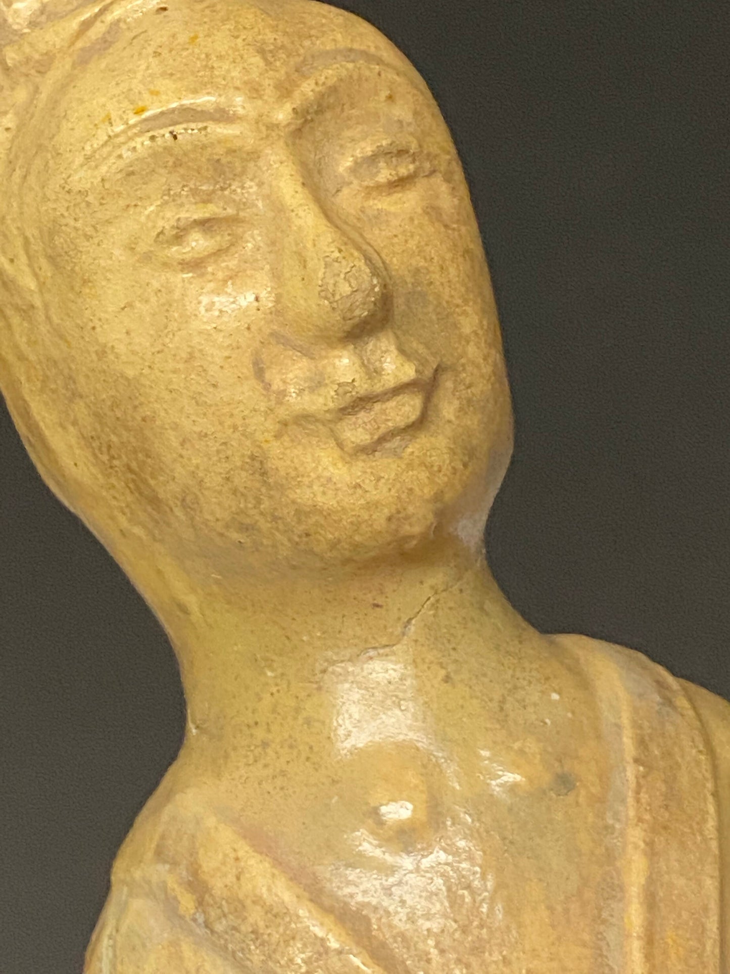 A  Museum quality 11 inch Chinese pottery statue depicting serene praying man  Evaluated as sui dynasty  small crack in neck