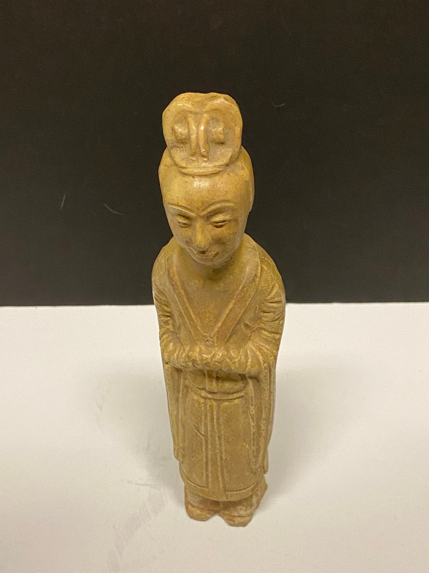 A  Museum quality 11 inch Chinese pottery statue depicting serene praying man  Evaluated as sui dynasty  small crack in neck