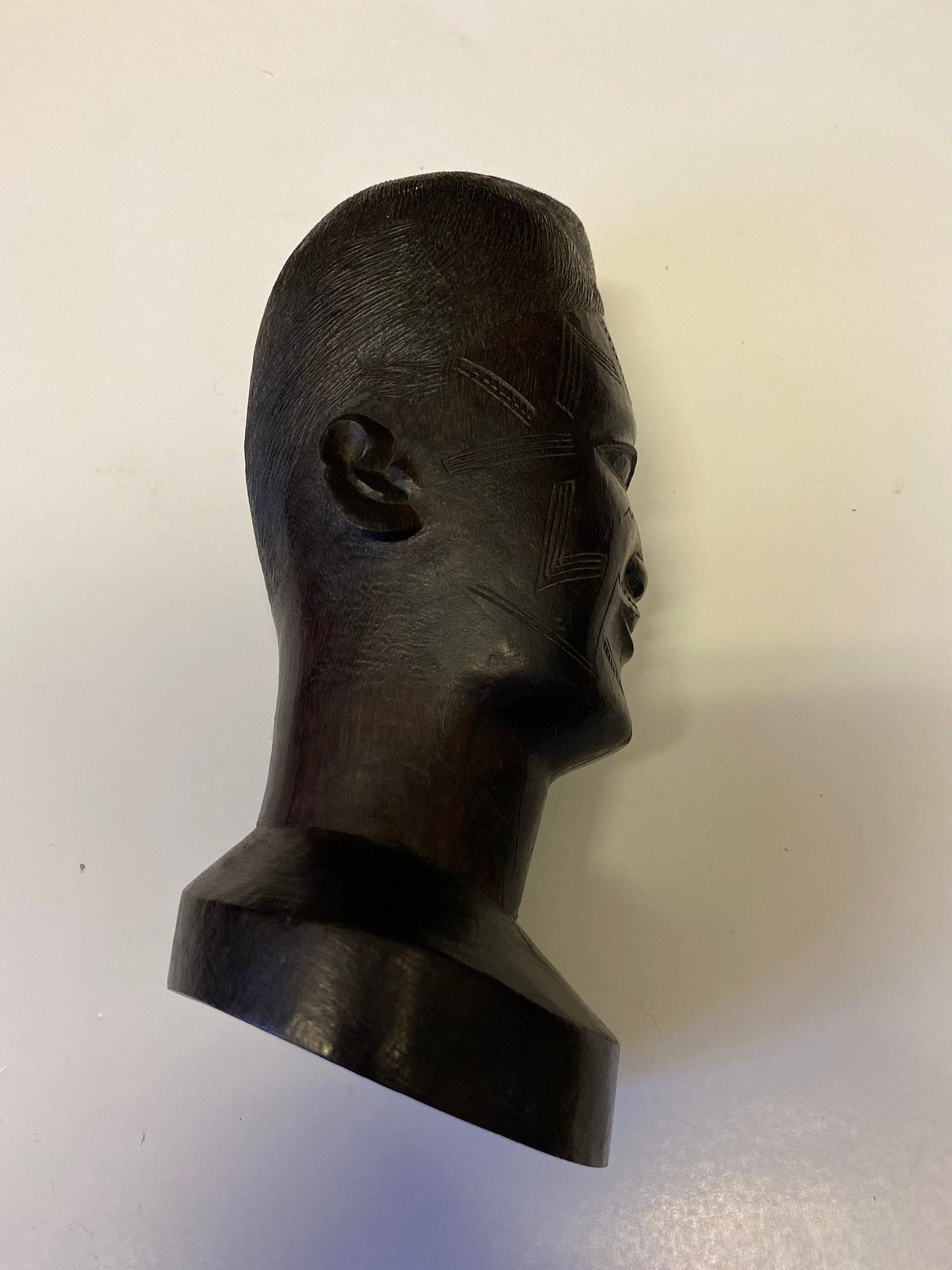 A Fabulous western 8 inch African Carved Ebony bust of a male warrior  great detail  wow  face detail is amazing