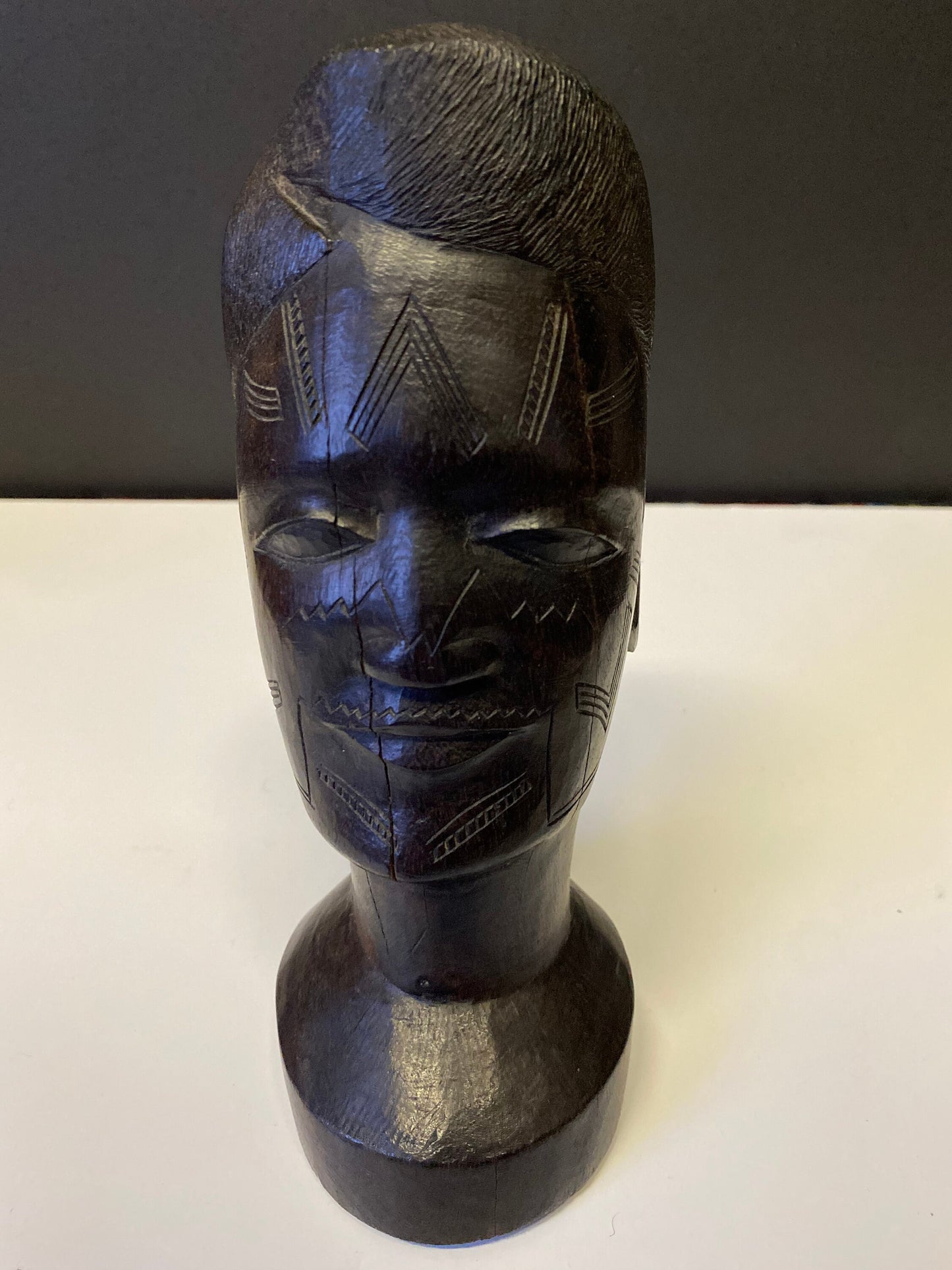 A Fabulous western 8 inch African Carved Ebony bust of a male warrior  great detail  wow  face detail is amazing