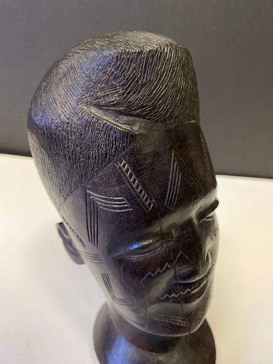 A Fabulous western 8 inch African Carved Ebony bust of a male warrior  great detail  wow  face detail is amazing