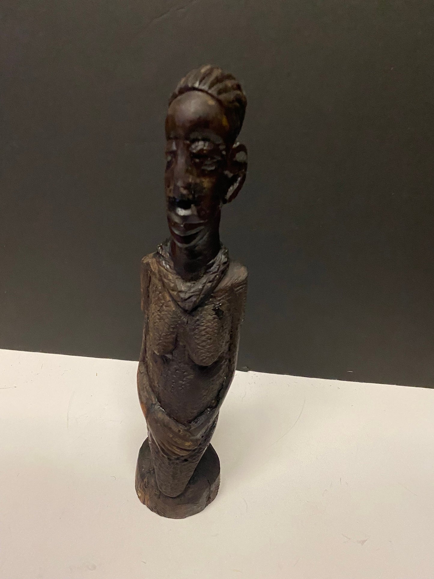 12 inch high western African wooden carved statue of a woman - Beautiful piece