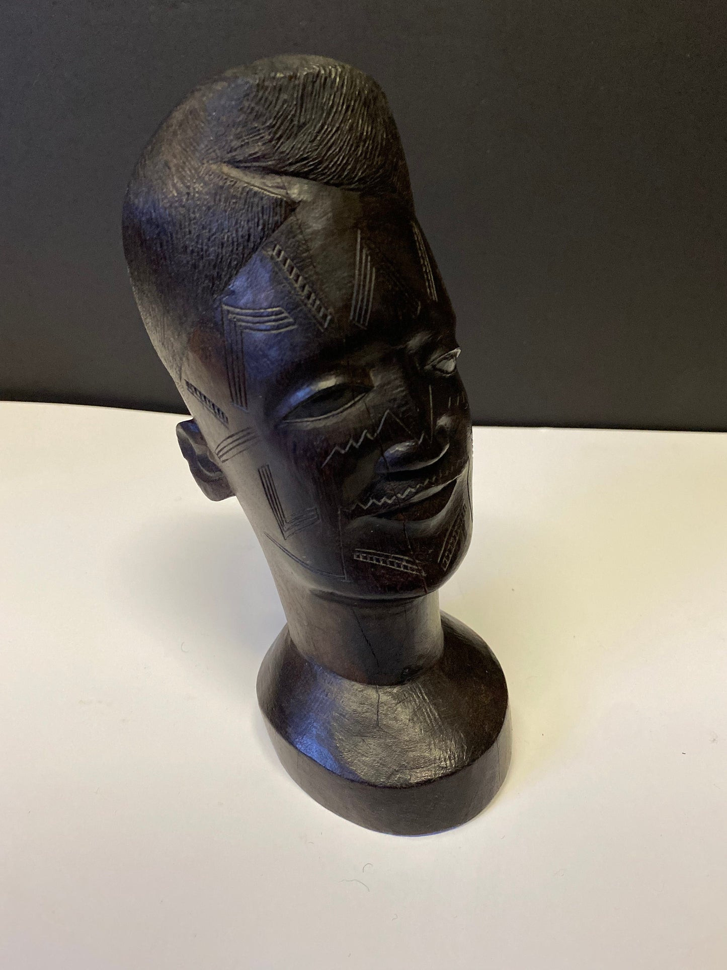 A Fabulous western 8 inch African Carved Ebony bust of a male warrior  great detail  wow  face detail is amazing