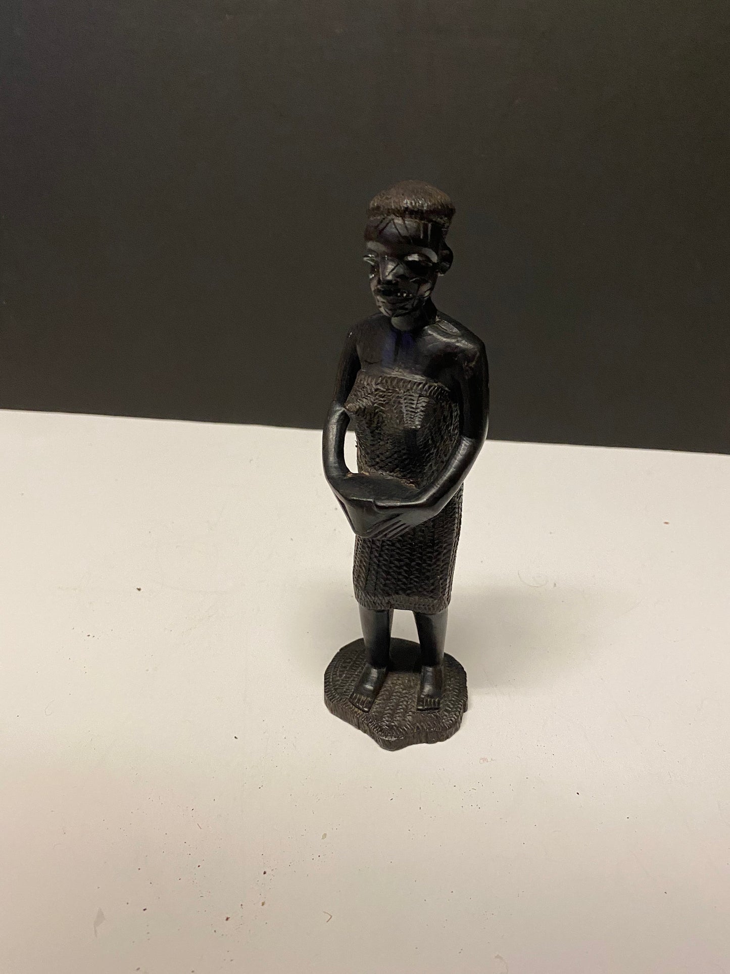 Fabulous 7 inch West African carved wooden  statue of a woman  well modelled  wow