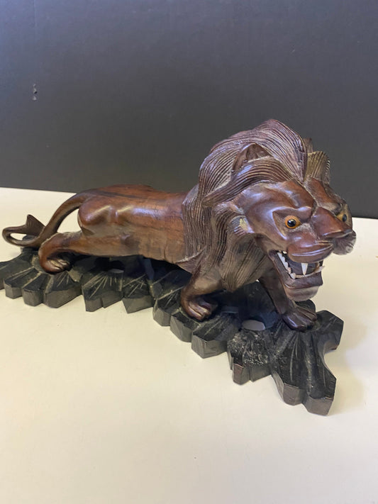 A  Fabulous 12 x 8 African ebony hardwood Carved lion on stand  regal and well carved  Would make a fabulous gift