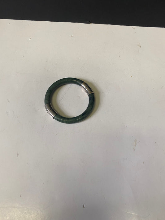 Lovely jade bangle with small crack  value priced  2.3 inches inside