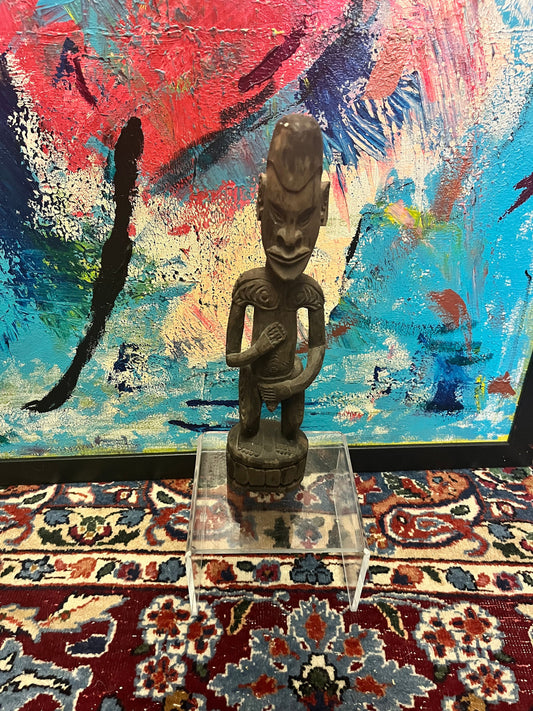 Absolutely fantastic 13 inch high antique African wooden statue of a man in a provocative position  Museum quality at a great price