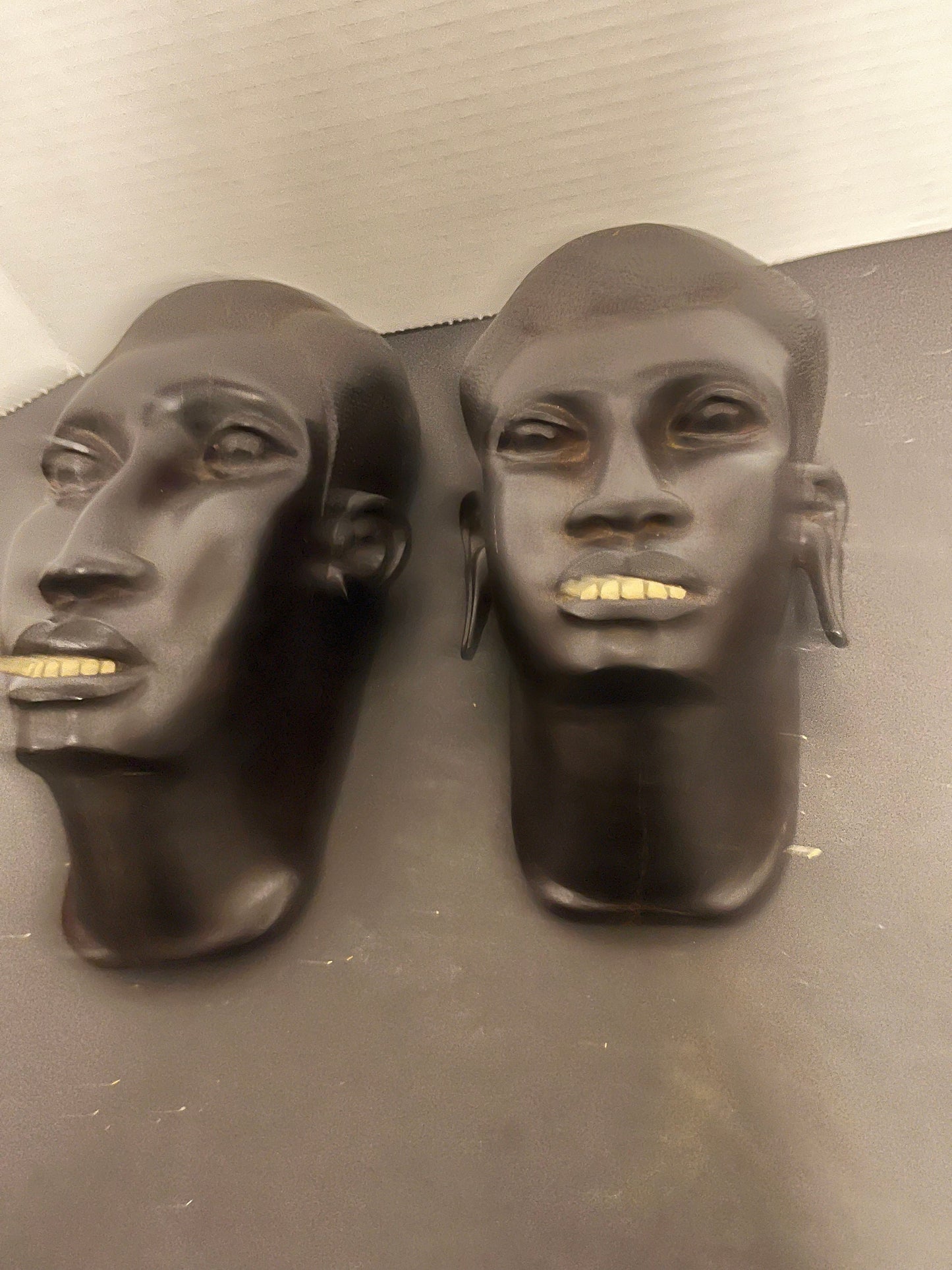 Absolutely magnificent antique western African Ebony his and her masks with original bone  teeth An absolute glorious path and great gift