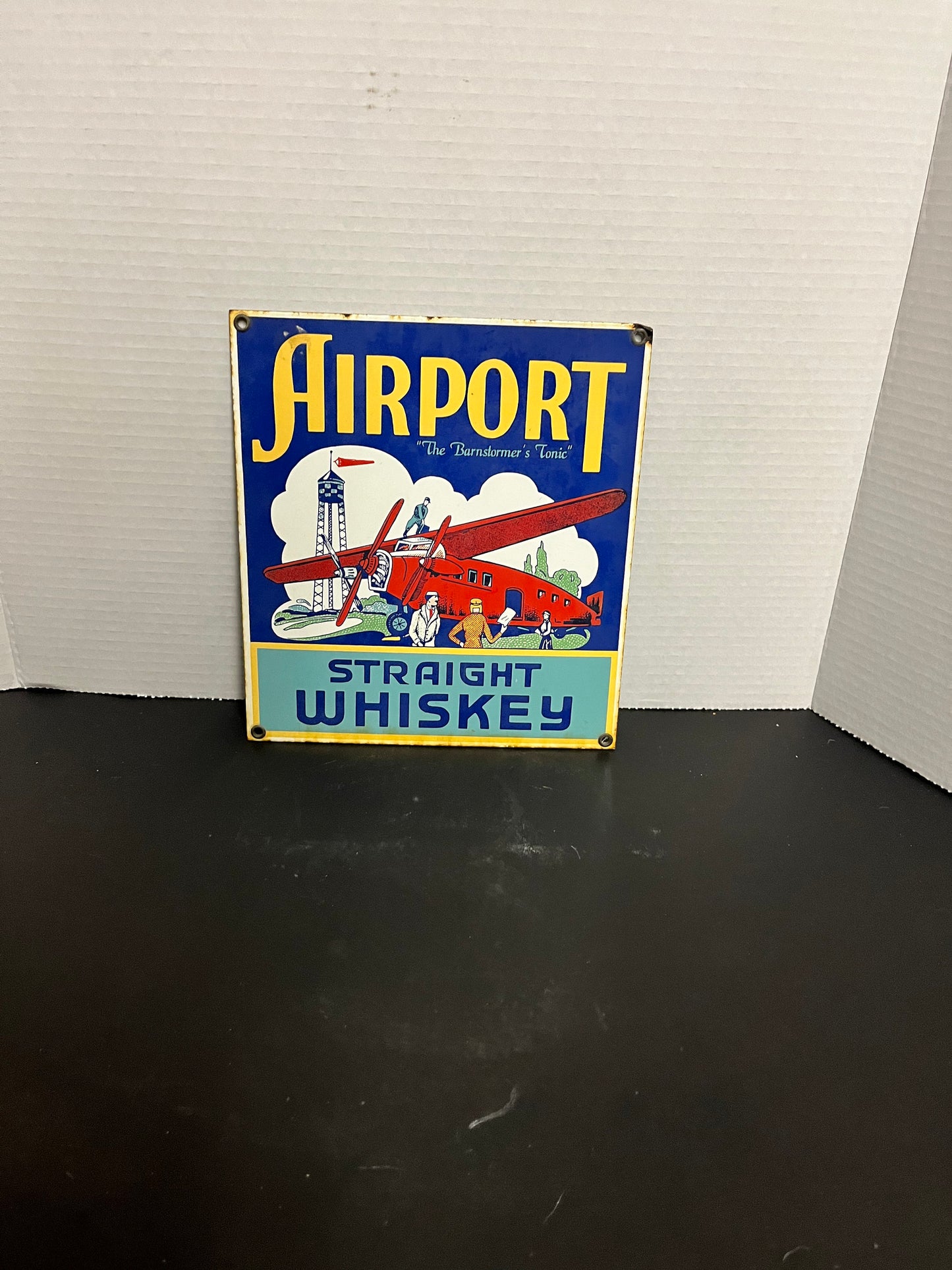 Authentic 8 1/2 x 9 1/2 tall airport straight whiskey Almost perfect condition one of a kind enamel sign