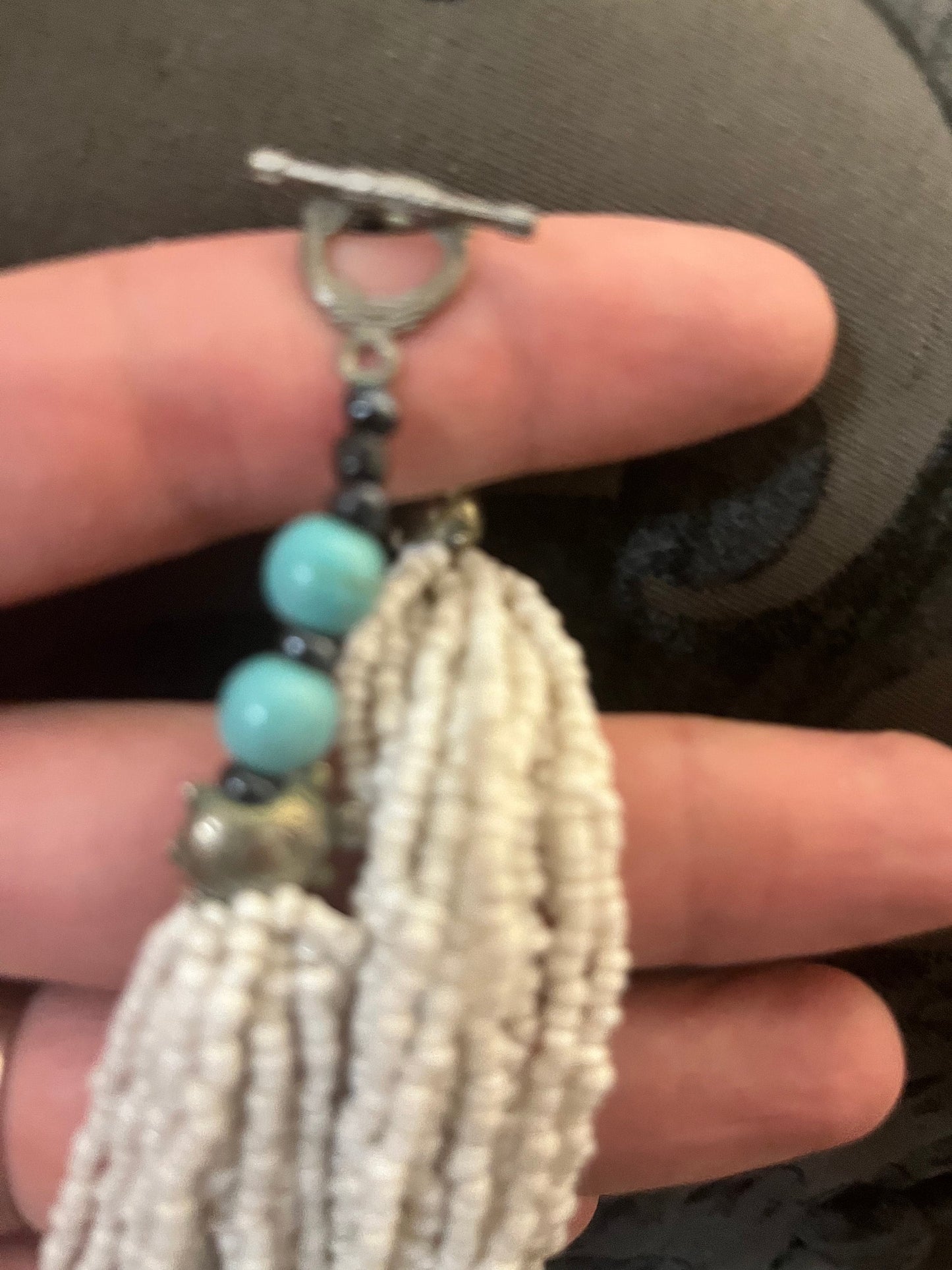 Beautiful, approximately 30 inch long, white coral necklace with turquoise