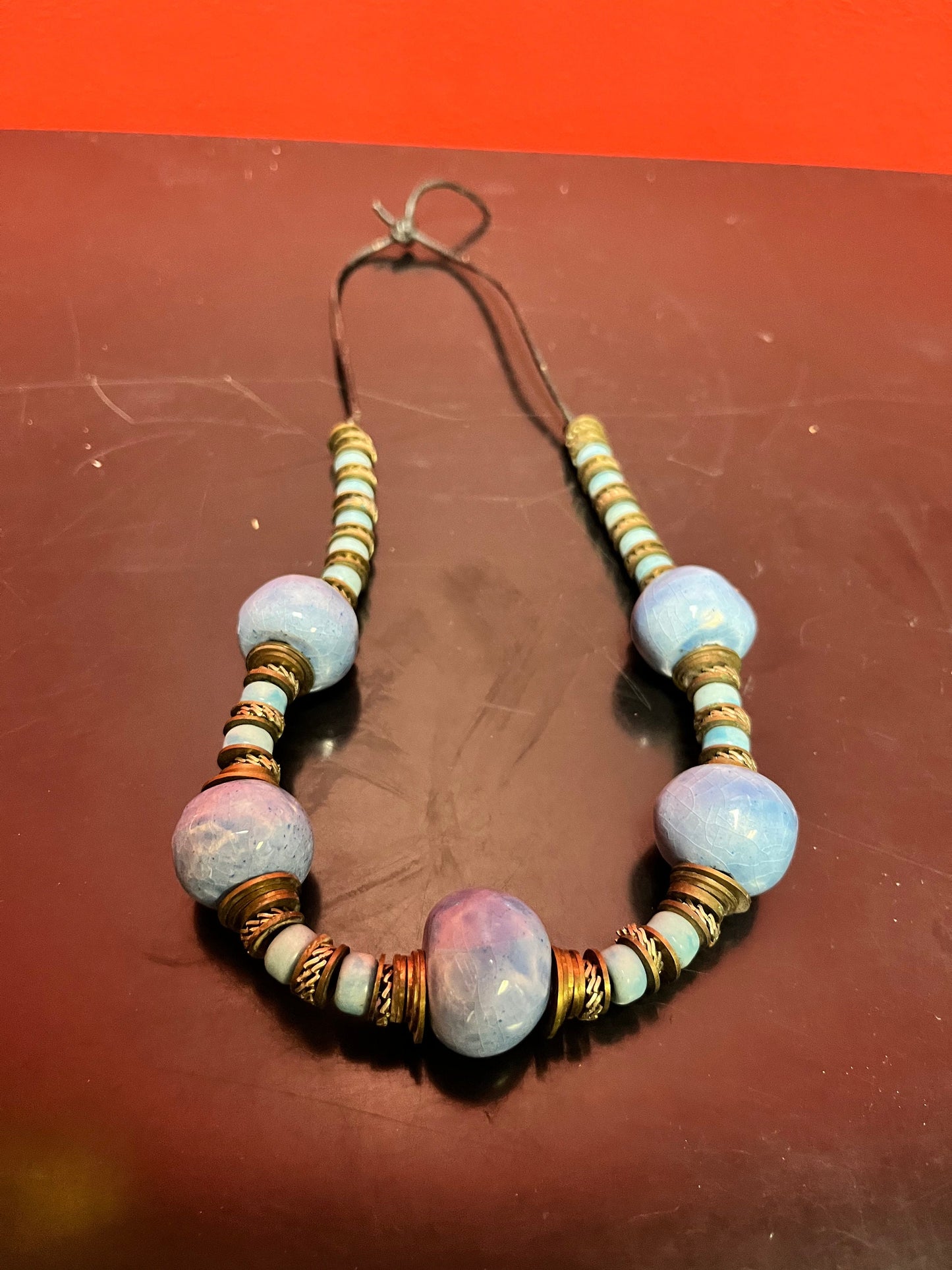 Beautiful pottery and silver necklace  vintage, and approximately 23 inches long  gray colour and very unusual