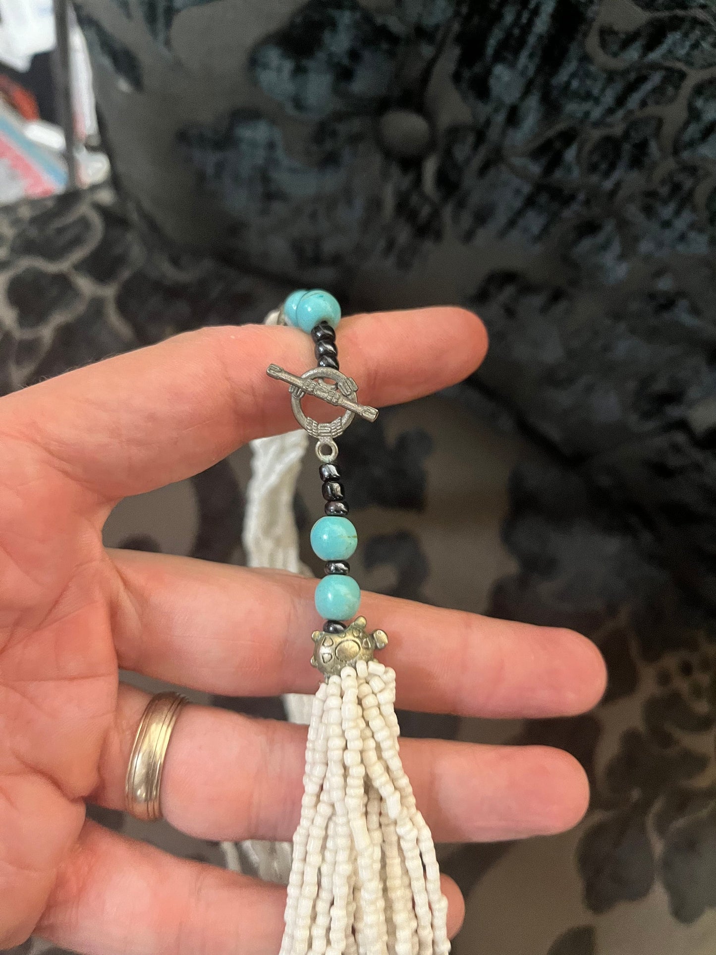 Beautiful, approximately 30 inch long, white coral necklace with turquoise