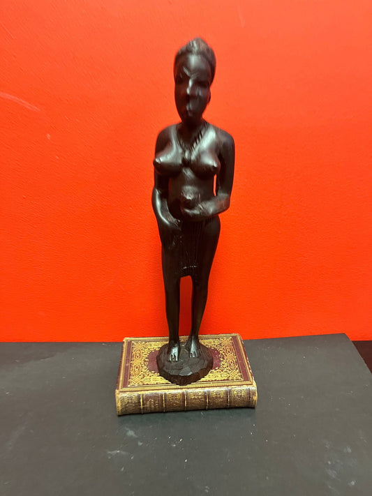 14 inch west African ebony statue of a lady with ample bosom  stunning quality in detail