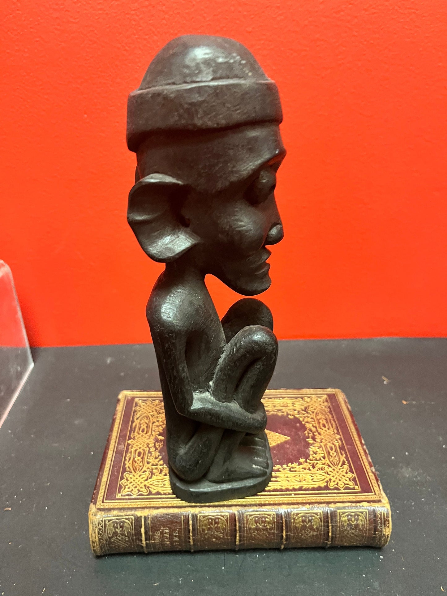 8.5 inch high western African seated vinatge wooden statue  great condition