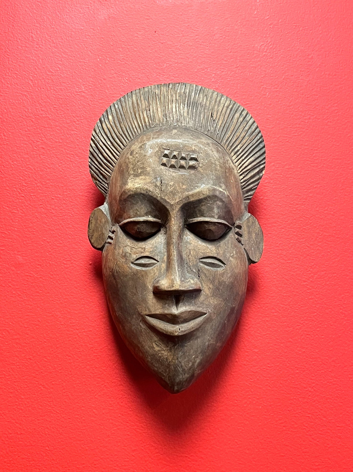 12.5 inch tall lovely western African mask ready to hang.  great detail, and great price