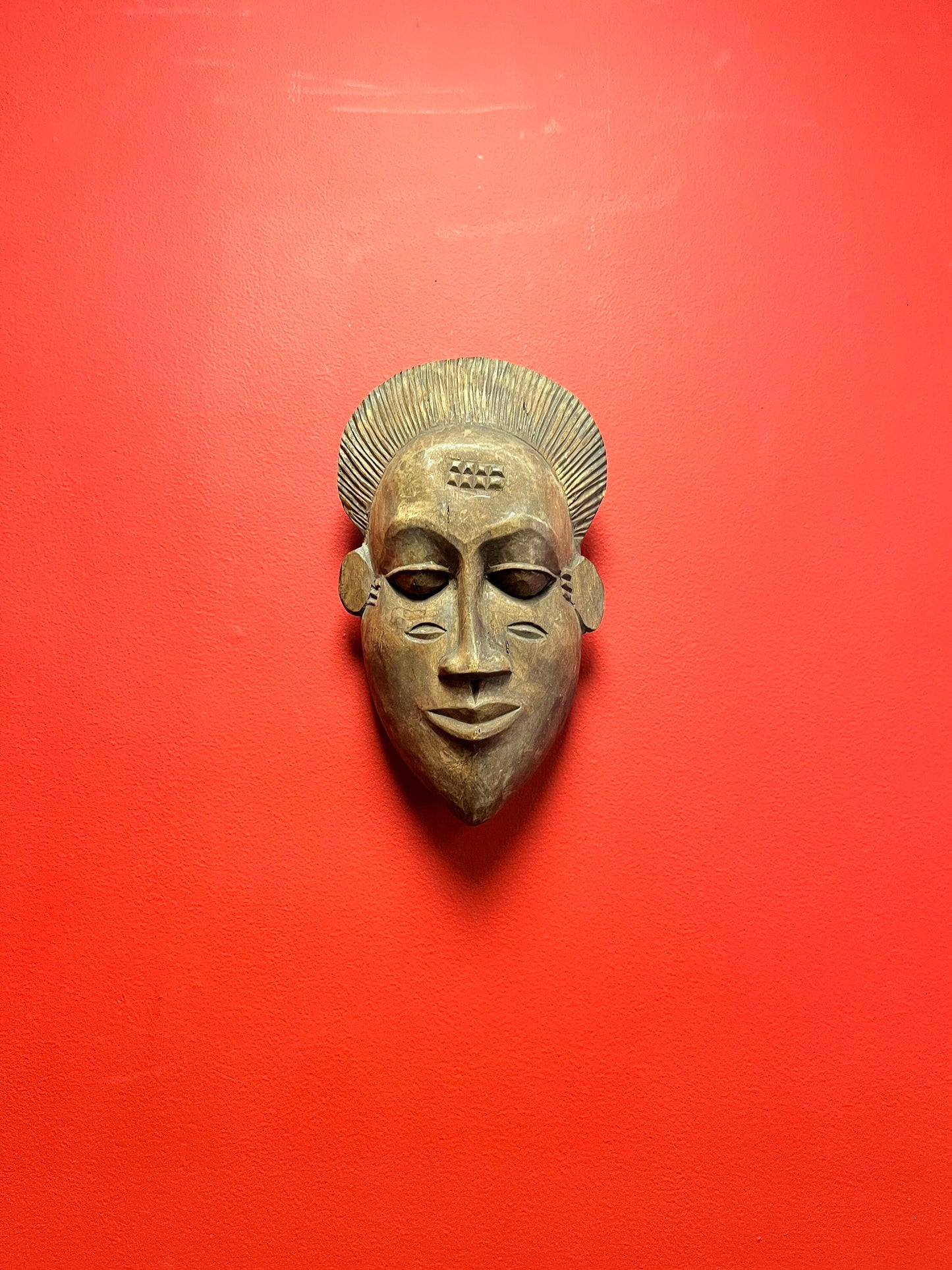 12.5 inch tall lovely western African mask ready to hang.  great detail, and great price