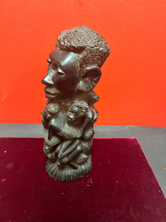 Well detailed 11 inch African Ebony wood Makonde statue  lovely heavy piece