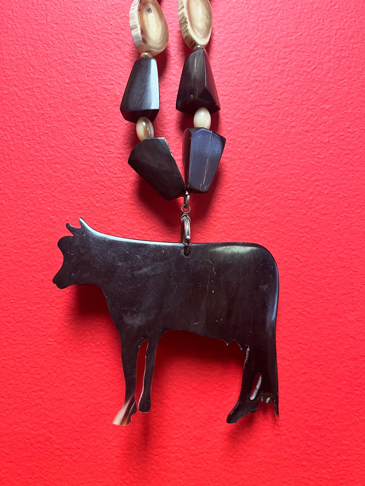 Unusual Asian horn necklace 24 inches approx with  cow pendant   magnificent piece and greet for a gift