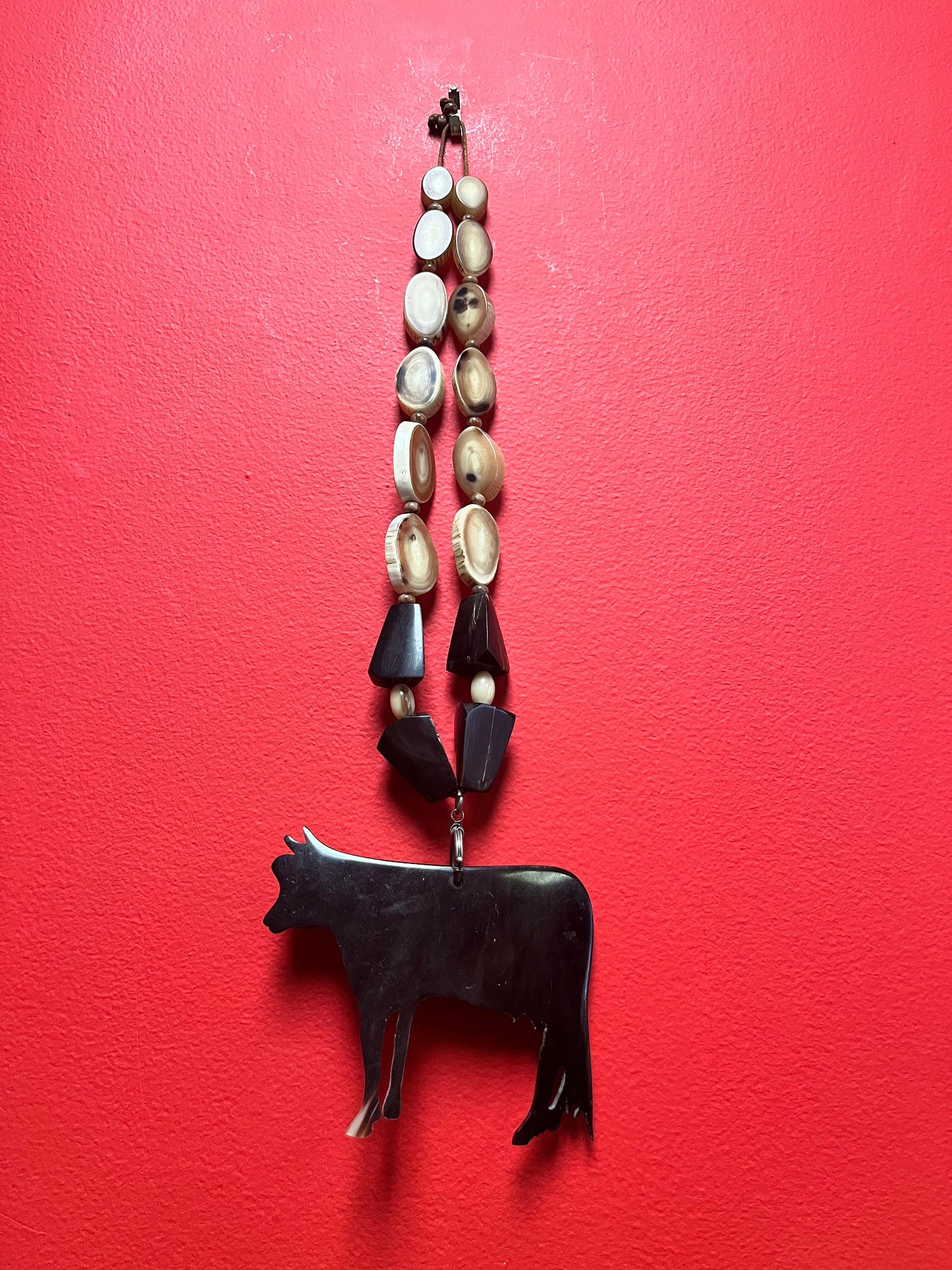 Unusual Asian horn necklace 24 inches approx with  cow pendant   magnificent piece and greet for a gift