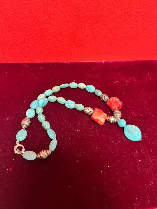 Approximately 20 inch long, turquoise and silver necklace