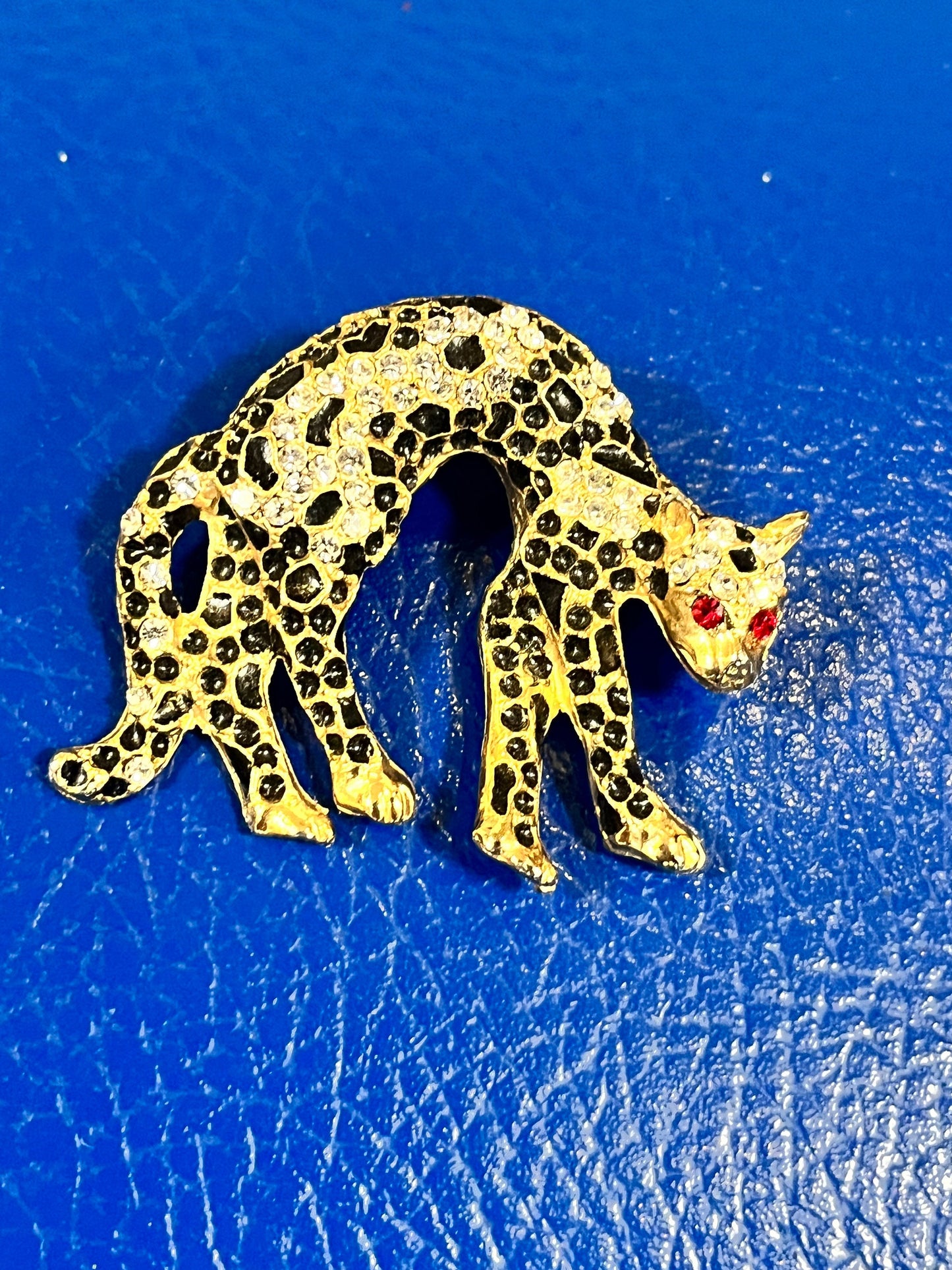 Lovely 2 inch rhinestone leopard brooch