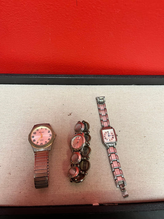 A  Nice lot of three designer watches as is -Great for tinkering or resale