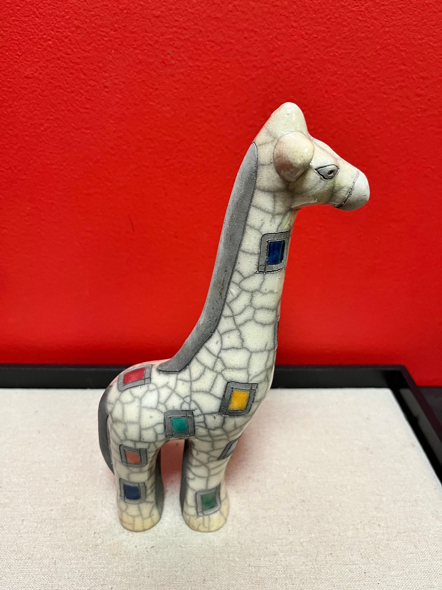 A  A Fenix pottery South African raku giraffe  Great condition - 9 inches high  Wonderful gift