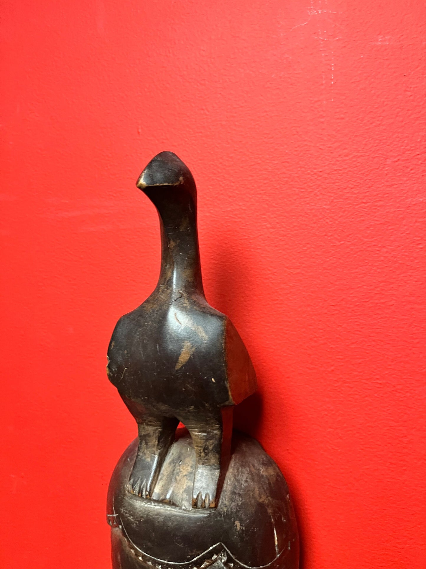 Studying antique ceremonial western African 11 inch tall bird mask   great patina and condition