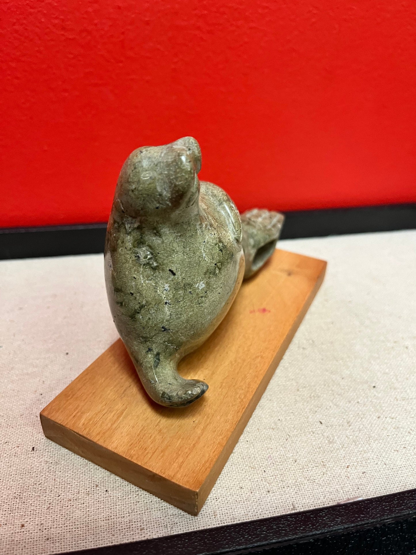 Lovely indigenous Inuit soapstone 7 x 4 high walrus on stand  cracked tail, so see photos and priced low accordingly