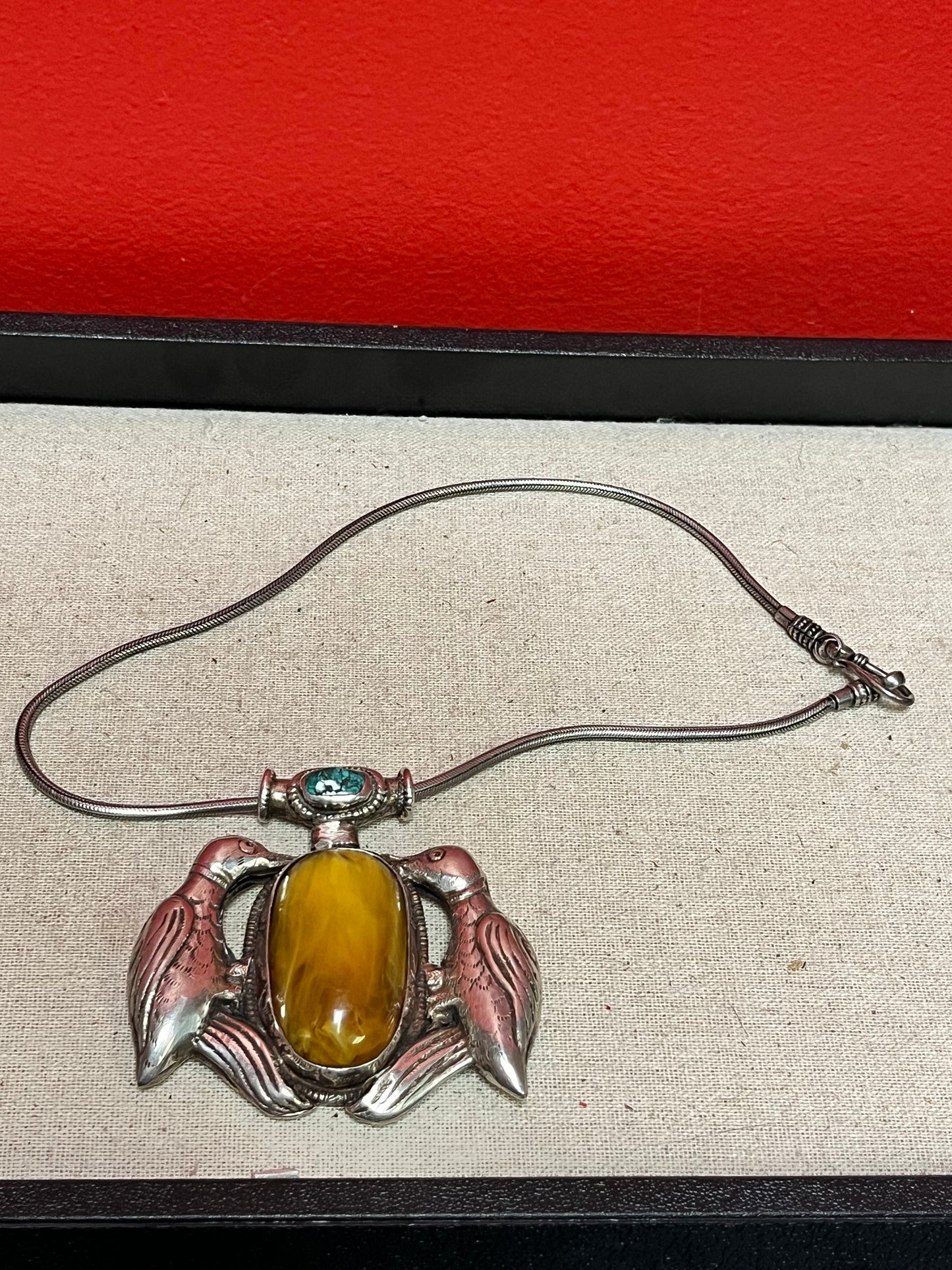 Huge Navajo sterling silver 3 inch pendant with inset turquoise and amber like stone   comes with silver chain  amazing piece