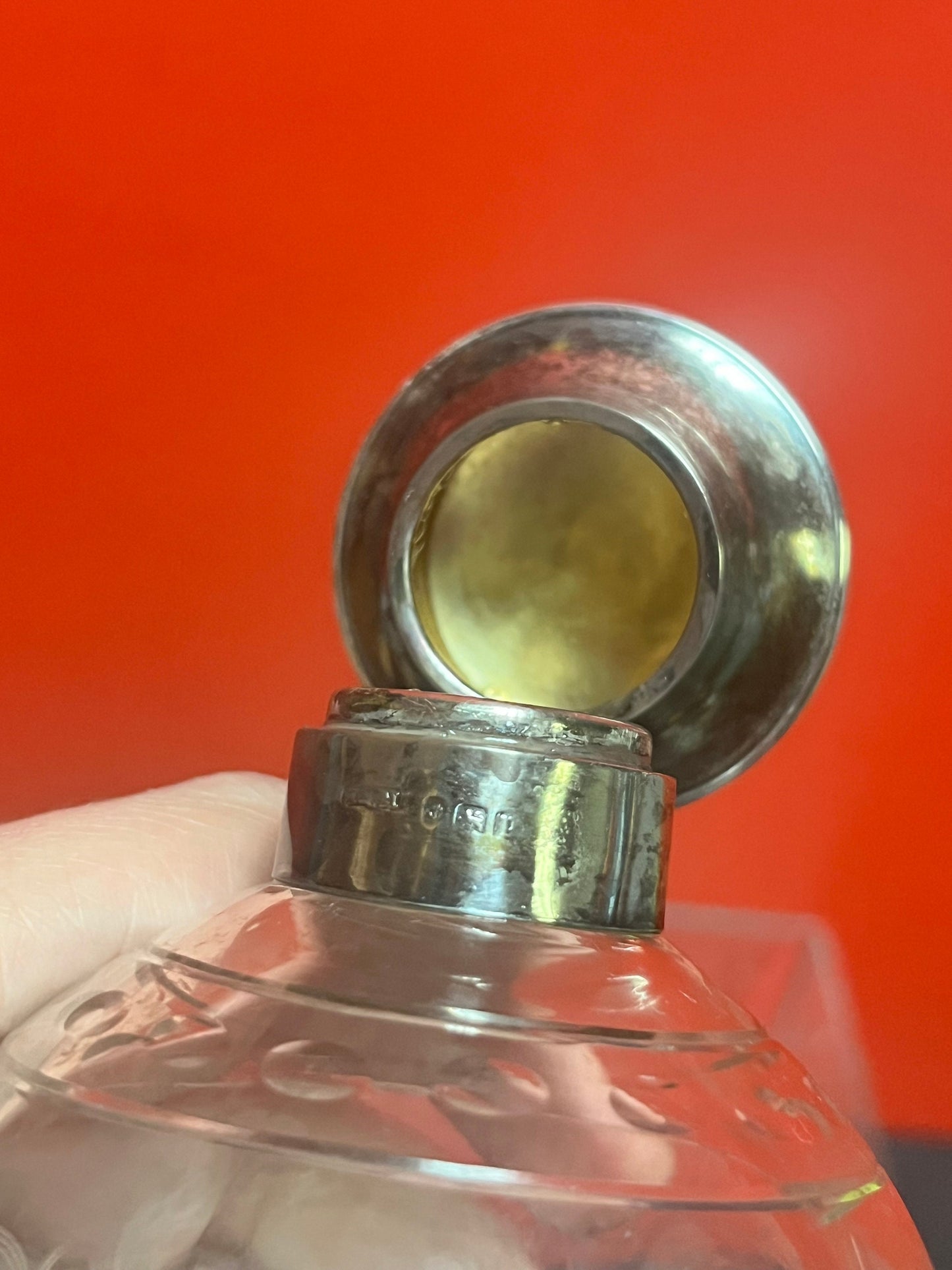 Lovely 5 inch tall sterling topped English perfume bottle in good condition