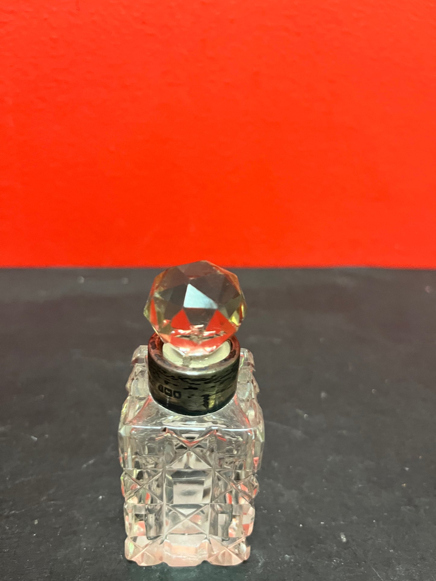 Lovely 3.5 inch tall crystal and hallmarked English sterling silver perfume bottle   nice condition