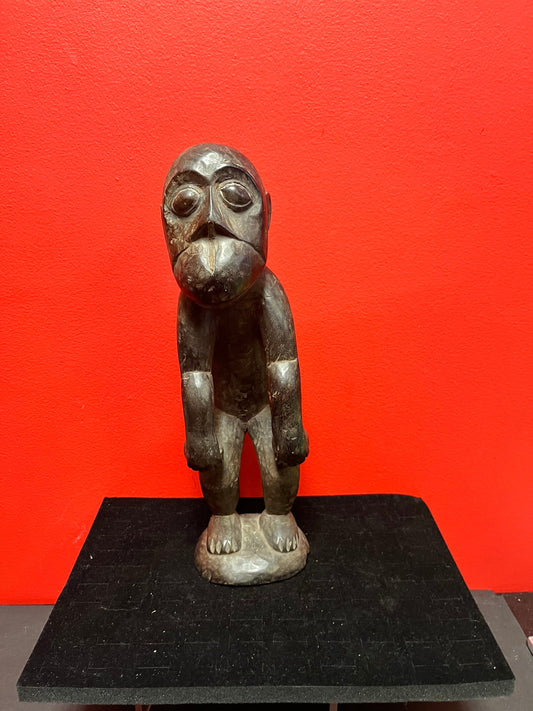 A  Stunning Unusual African statue of a monkey man - antique with wonderful patina in great condition - 14 inches tall