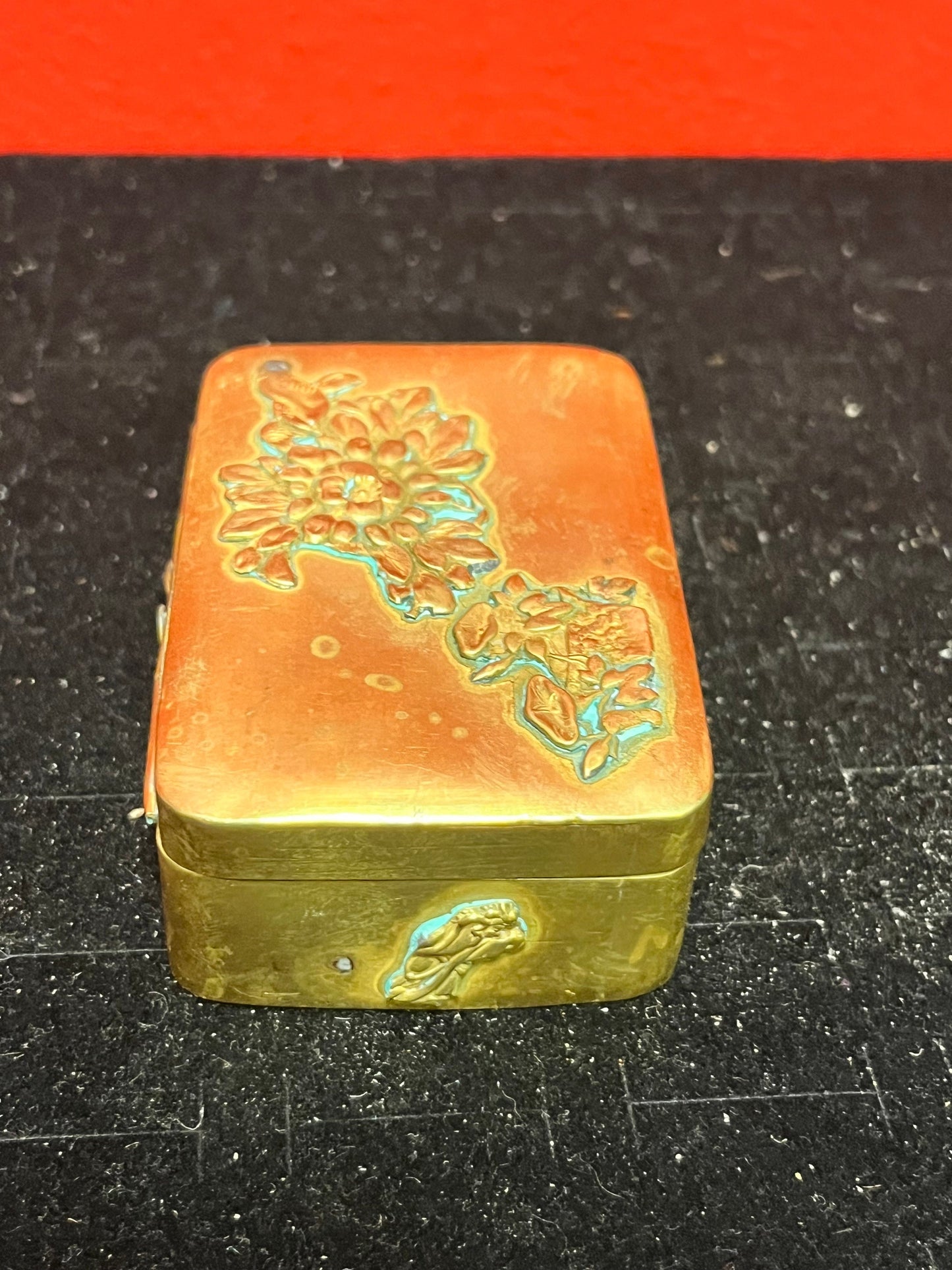 3 x 2 x 1 high Japanese brass stamp box   great patina  antique beauty  little finicky to close  Japanese chrysanthemums