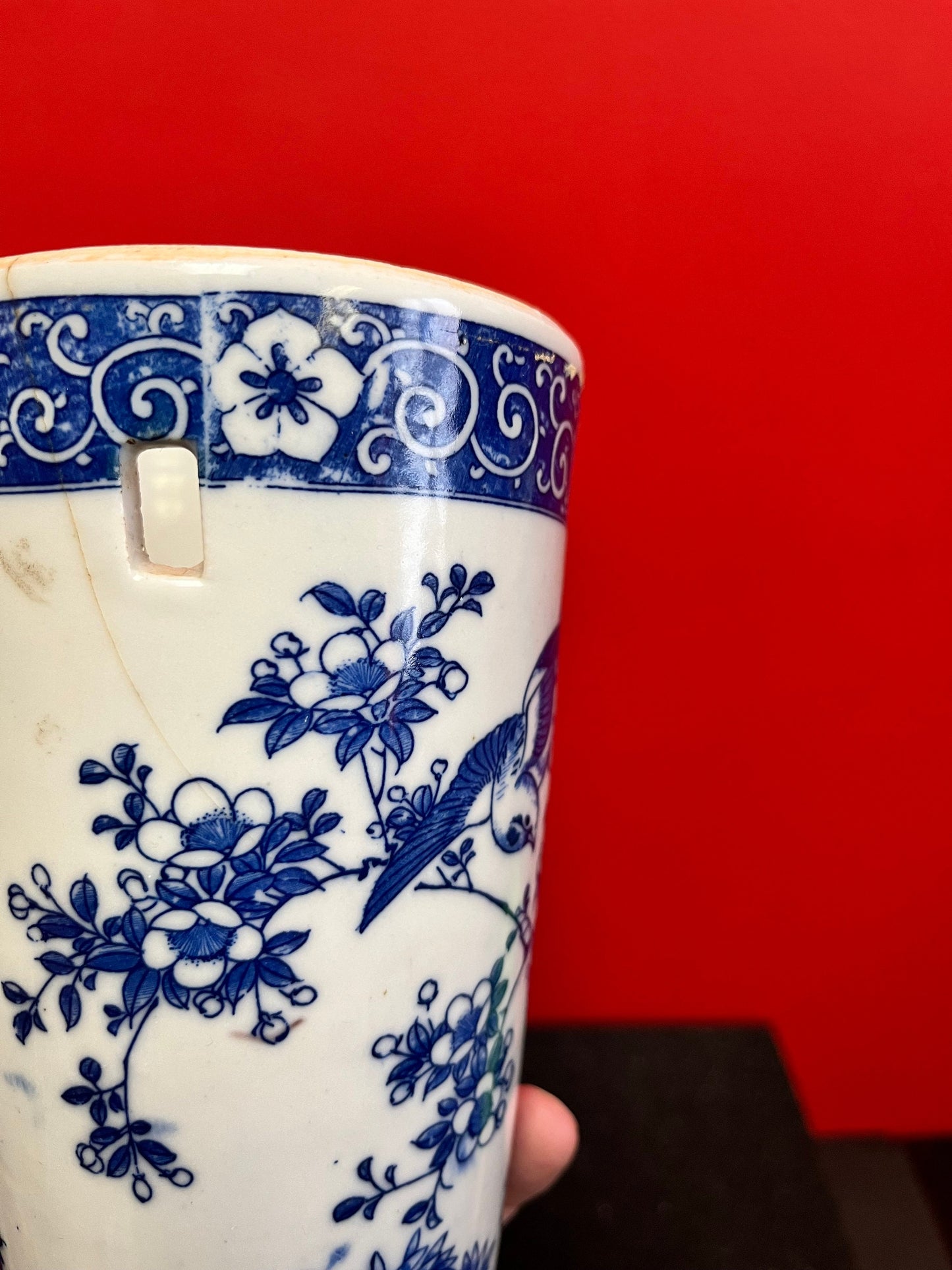 13 inch tall, antique Chinese, beautiful blue and white wall hanging vase with a crack